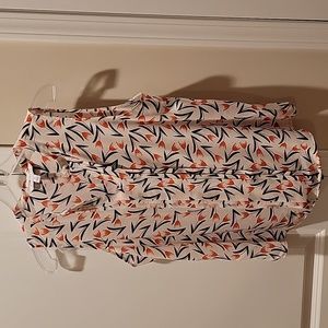 41 Hawthorn black, orange, and off-white sleeveless blouse